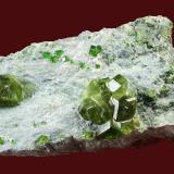 Andradite ( var. demantoid )
Val Malenco, Sondrio Province, Lombardia Region, Italy

85 x 46 x 35 mm (Author: GneissWare)