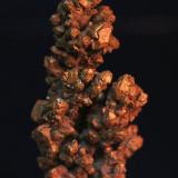 Copper, Cuprite
Rubtsovskoe Cu-Zn-Pb Deposit, Rudnyi Altai, Altaiskii Krai,  Western-Siberian Region, Russia
6.0 x 3.0 cm (Author: Don Lum)
