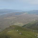 Ben Loyal, Sutherland, Scotland
The mist cleared briefly and afforded a view looking west towards my wild campsite, just the other side of the small loch (lake) which is on the nearside of the sea-inlet, which is called the ’Kyle of Tongue’. (Author: Mike Wood)