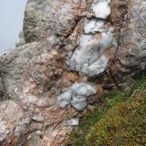 Ben Loyal, Sutherland, Scotland
I came across this section of pegmatite vein, which wasn’t exotic, merely containing pink microcline and quartz, and not showing any euhedral crystals. But it showed I was getting warmer.. (Author: Mike Wood)