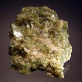 Eastonite
C. K. Williams Quarry, Easton, Northhampton County, Pennsylvania, USA
9.5 x 11.0 cm
Yellowish-green eastonite embedded in a light colored matrix from the type locality. (Author: crosstimber)