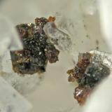 Wurtzite
Shijiangshan, Ulanhad League, Inner Mongolia A.R., China
FOV 0.3 cm
The high temperature hexagonal polymorph of Sphalerite, here crystallized on Pentahydroborite (Author: Cesar M. Salvan)