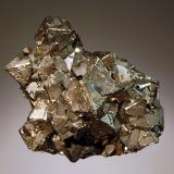 Pyrite
Murgul Cu-Zn-Pb deposit, Murgul, Artvin Province, Black Sea Region, Turkey
6.0 x 6.5 cm
Sharp brassy octahedral crystals of pyrite to 1.5 cm on a massive pyrite matrix. (Author: crosstimber)
