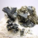 TetrahedriteMina Cavnic, zona minera Cavnic, Cavnic, Maramures, RumaníaH:7.5 cm x W:7.5 cm x D:3.6 cm; Largest Crystal: 2 (Author: Adrian Pripoae)
