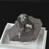 Fluorite, Calcite, Quartz on Hematite<br />Florence Mine, Egremont, West Cumberland Iron Field, former Cumberland, Cumbria, England / United Kingdom<br />3x3cm<br /> (Author: captaincaveman)