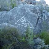 Some of these &rsquo;bergies&rsquo; (mountain dwellers) appear to belong to some or other gang.  These symbols are found spread over a wide area in the mountains.  I suspect they are made by painting Javel (bleach) on the sandstone rocks. (Author: Pierre Joubert)