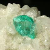 Beryl (variety emerald), Calcite<br />Muzo mining district, La Pava Mine, Quípama, Municipio Muzo, Western Emerald Belt, Boyacá Department, Colombia<br />37x34x38mm<br /> (Author: Fiebre Verde)