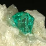 Beryl (variety emerald), Calcite<br />Muzo mining district, La Pava Mine, Quípama, Municipio Muzo, Western Emerald Belt, Boyacá Department, Colombia<br />37x34x38mm<br /> (Author: Fiebre Verde)