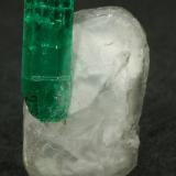 Beryl (variety emerald), Calcite<br />Muzo mining district, Western Emerald Belt, Boyacá Department, Colombia<br />Emerald 18mm / Calcite 24mm<br /> (Author: Fiebre Verde)