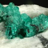 Beryl (variety emerald), Calcite<br />Coscuez mining district, Municipio San Pablo de Borbur, Western Emerald Belt, Boyacá Department, Colombia<br />Detail - FOV=5cm<br /> (Author: Fiebre Verde)