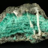 Beryl (variety emerald), Calcite<br />La Pita mining district, Cunas Mine, Municipio Maripí, Western Emerald Belt, Boyacá Department, Colombia<br />12x11x5cm<br /> (Author: Fiebre Verde)