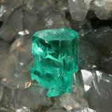 Beryl (variety emerald), Calcite<br />La Pita mining district, Municipio Maripí, Western Emerald Belt, Boyacá Department, Colombia<br />Detail - FOV=2.5cm<br /> (Author: Fiebre Verde)