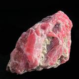 Rhodonite<br />Morro da Mina Mine, Conselheiro Lafaiete, Minas Gerais, Brazil<br />4.2 x 2.7 cm<br /> (Author: steven calamuci)