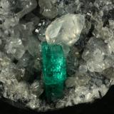 Beryl (variety emerald), Calcite<br />La Pita mining district, Municipio Maripí, Western Emerald Belt, Boyacá Department, Colombia<br />Detail - FOV=2cm<br /> (Author: Fiebre Verde)