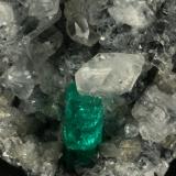 Beryl (variety emerald), Calcite<br />Coscuez mining district, La Tabla Mine, Municipio San Pablo de Borbur, Western Emerald Belt, Boyacá Department, Colombia<br />Detail - FOV=2cm<br /> (Author: Fiebre Verde)