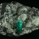 Beryl (variety emerald), Calcite<br />La Pita mining district, Municipio Maripí, Western Emerald Belt, Boyacá Department, Colombia<br />46x42x34mm<br /> (Author: Fiebre Verde)