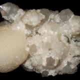 Quartz with calcite and calcite egg<br />Cavnic mining area, Cavnic, Maramures, Romania<br />~ 10.5 cm<br /> (Author: Deyu)