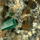 Beryl (variety emerald), Calcite<br />La Pita mining district, Cunas Mine, Municipio Maripí, Western Emerald Belt, Boyacá Department, Colombia<br />Detail - xl length=14mm<br /> (Author: Fiebre Verde)