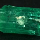 Beryl (variety emerald), Quartz<br />Muzo mining district, Western Emerald Belt, Boyacá Department, Colombia<br />xl=19mm<br /> (Author: Fiebre Verde)