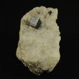 Pirita, Calcita<br />Yacimiento de piritas, Llanos de Arenalejos, Carratraca, Comarca Valle del Guadalhorce, Málaga, Andalucía, España<br />4.5 x 3.5 x 2.4 centimetros<br /> (Autor: Ricardo Melendez)