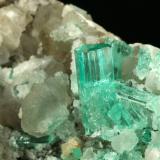 Beryl (variety emerald), Calcite<br />Coscuez mining district, Municipio San Pablo de Borbur, Western Emerald Belt, Boyacá Department, Colombia<br />85x80x60mm - Detail<br /> (Author: Fiebre Verde)