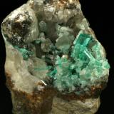 Beryl (variety emerald), Calcite<br />Coscuez mining district, Municipio San Pablo de Borbur, Western Emerald Belt, Boyacá Department, Colombia<br />85x80x60mm<br /> (Author: Fiebre Verde)