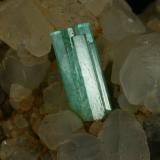 Beryl (variety emerald), Calcite<br />La Pita mining district, Polveros Mine, Municipio Maripí, Western Emerald Belt, Boyacá Department, Colombia<br />Detail - FOV=3.5cm<br /> (Author: Fiebre Verde)