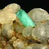 Beryl (variety emerald), Calcite<br />La Pita mining district, Polveros Mine, Municipio Maripí, Western Emerald Belt, Boyacá Department, Colombia<br />Detail - FOV=4.5cm<br /> (Author: Fiebre Verde)