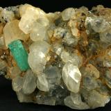 Beryl (variety emerald), Calcite<br />La Pita mining district, Polveros Mine, Municipio Maripí, Western Emerald Belt, Boyacá Department, Colombia<br />90x55x39mm<br /> (Author: Fiebre Verde)