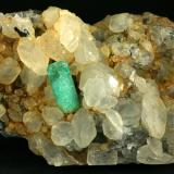 Beryl (variety emerald), Calcite<br />La Pita mining district, Polveros Mine, Municipio Maripí, Western Emerald Belt, Boyacá Department, Colombia<br />90x55x39mm<br /> (Author: Fiebre Verde)