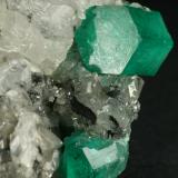 Beryl (variety emerald), Calcite<br />La Pita mining district, Cunas Mine, Municipio Maripí, Western Emerald Belt, Boyacá Department, Colombia<br />60x50x35mm<br /> (Author: Fiebre Verde)