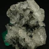 Beryl (variety emerald), Calcite<br />La Pita mining district, Cunas Mine, Municipio Maripí, Western Emerald Belt, Boyacá Department, Colombia<br />60x50x35mm<br /> (Author: Fiebre Verde)