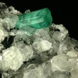 Beryl (variety emerald), Calcite<br />La Pita mining district, Polveros Mine, Municipio Maripí, Western Emerald Belt, Boyacá Department, Colombia<br />80x55x80mm<br /> (Author: Fiebre Verde)