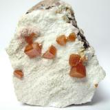 Wulfenite<br />Erupción Mine (Ahumada Mine), Los Lamentos Mountain Range, Municipio Ahumada, Chihuahua, Mexico<br />65 mm x 50 mm x 30 mm, largest wulfenite 7 mm<br /> (Author: Tobi)