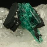 Beryl (variety emerald), Calcite<br />Muzo mining district, Western Emerald Belt, Boyacá Department, Colombia<br />60x45x28mm<br /> (Author: Fiebre Verde)