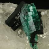 Beryl (variety emerald), Calcite<br />Muzo mining district, Western Emerald Belt, Boyacá Department, Colombia<br />60x45x28mm<br /> (Author: Fiebre Verde)