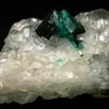 Beryl (variety emerald), Calcite<br />Muzo mining district, Western Emerald Belt, Boyacá Department, Colombia<br />60x45x28mm<br /> (Author: Fiebre Verde)