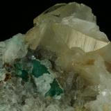 Beryl (variety emerald), Calcite, QuartzMina Peñas Blancas, Municipio San Pablo de Borbur, Cinturón Esmeraldífero Occidental, Departamento Boyacá, Colombia80x90x35mm (Author: Fiebre Verde)