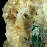 Beryl (variety emerald), Calcite, QuartzMina Peñas Blancas, Municipio San Pablo de Borbur, Cinturón Esmeraldífero Occidental, Departamento Boyacá, Colombia80x90x35mm (Author: Fiebre Verde)
