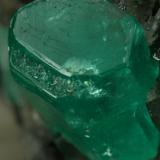 Beryl (variety emerald), Calcite<br />Coscuez mining district, Municipio San Pablo de Borbur, Western Emerald Belt, Boyacá Department, Colombia<br />35x40x55mm<br /> (Author: Fiebre Verde)
