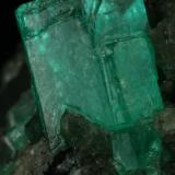 Beryl (variety emerald), Calcite<br />Coscuez mining district, Municipio San Pablo de Borbur, Western Emerald Belt, Boyacá Department, Colombia<br />35x40x55mm<br /> (Author: Fiebre Verde)