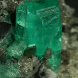 Beryl (variety emerald), Calcite<br />Coscuez mining district, Municipio San Pablo de Borbur, Western Emerald Belt, Boyacá Department, Colombia<br />35x40x55mm<br /> (Author: Fiebre Verde)