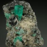 Beryl (variety emerald), Calcite<br />Coscuez mining district, Municipio San Pablo de Borbur, Western Emerald Belt, Boyacá Department, Colombia<br />35x40x55mm<br /> (Author: Fiebre Verde)