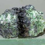 Moscovita (variedad fengita) y GlaucofanaPollone, Provincia Biella, Piamonte (Piemonte), Italia45x30 mm (Autor: Juan Espino)