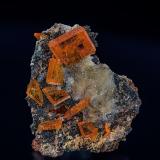 Wulfenite, QuartzChah Milleh Mine, Chah Milleh, Anarak District, Nain, Isfahan Province, Iran3.2 x 2.7 cm (Author: am mizunaka)