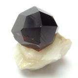 Spessartine<br />Shigar Valley, Shigar District, Gilgit-Baltistan (Northern Areas), Pakistan<br />Specimen size 2 cm, garnet crystal 1,5 cm<br /> (Author: Tobi)