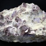 Lepidolita (Grupo Mica)Alvarrões Mine (concession C-8), Seixo Amarelo-Gonçalo-Vela, Guarda, Guarda District, Centro Region, Portugal15cm por 11cm (Autor: canada)