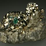 Beryl (variety emerald), Calcite, Pyrite, Dolomite<br />Chivor mining district, El Acuario Mine, Municipio Chivor, Eastern Emerald Belt, Boyacá Department, Colombia<br />60x45x55mm<br /> (Author: Fiebre Verde)