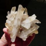 Quartz<br /><br />Hands for size.<br /> (Author: Pierre Joubert)