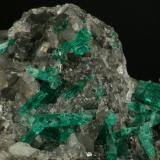 Beryl (variety emerald), Calcite<br />La Pita mining district, Municipio Maripí, Western Emerald Belt, Boyacá Department, Colombia<br />Detail<br /> (Author: Fiebre Verde)